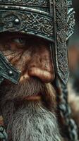 Detailed close-up of a warrior with ornate helmet and fierce expression during a historical reenactment event photo