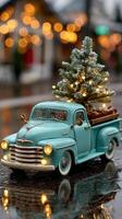 Vintage truck delivers Christmas tree during a rainy evening with festive lights in the background photo
