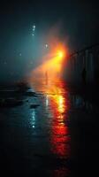 Mysterious figure walks on wet pavement illuminated by warm light in a foggy urban setting at night photo