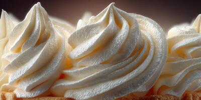 Delicious whipped cream artfully piped on a dessert in an elegant presentation during a summer afternoon gathering photo