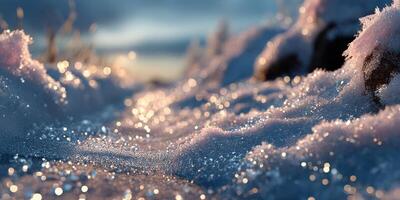 Snow-covered landscape reflecting winter light with sparkling frost in early morning at a tranquil location photo