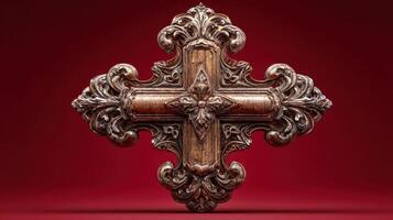 Intricate wooden cross with ornate carvings against a deep red background highlighting craftsmanship and artistry photo