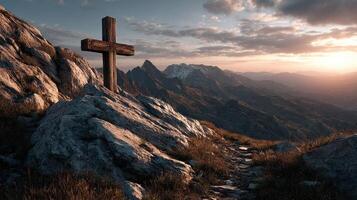 Scenic mountain view at sunset with wooden cross on rocky terrain in a tranquil outdoor setting photo