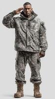 Military personnel in camouflage uniform saluting during training exercise in military base photo
