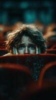Audience member experiences intense emotion during gripping performance in a theater photo