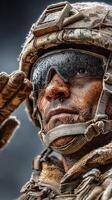 Soldier saluting with determination in a dusty environment during military training exercises photo