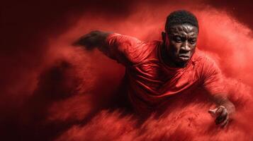 Dynamic athlete sprinting through vibrant red smoke during an energetic performance in bold athletic wear photo
