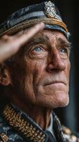 Elderly military officer salutes with pride in traditional uniform during ceremony in a ceremonial hall photo