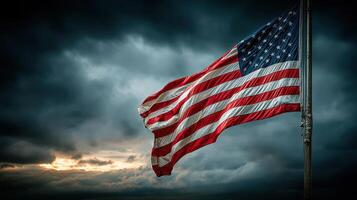 American flag waving against a dramatic cloudy sky during sunset photo