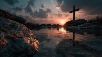 Sunset over a tranquil lake with a wooden cross reflecting in the water photo