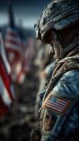 Soldier stands solemnly during memorial service with American flags in the background at a military event photo