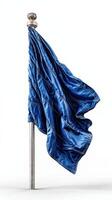Beautiful blue flag waving gently on a silver pole against a plain background photo