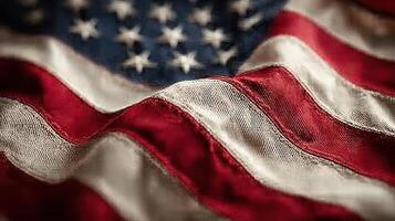 Waving American flag close-up shows texture and vibrant colors on a sunny day photo