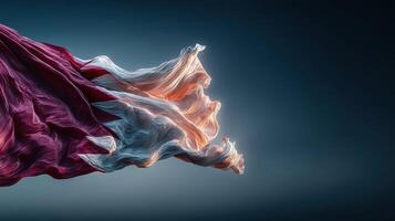 Elegant flowing fabric creates a stunning visual display in twilight shades of maroon and white photo