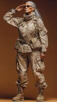 Military veteran saluting in combat uniform during a studio portrait session photo