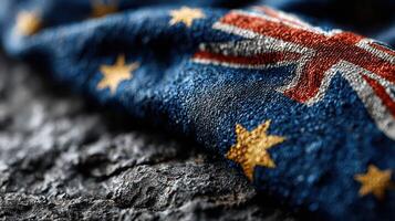 Australian flag draped over textured surface highlighting national colors and symbols photo