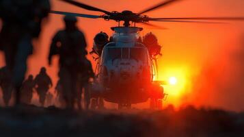 Soldiers approach helicopter during sunset highlighting military operations in a desert location photo