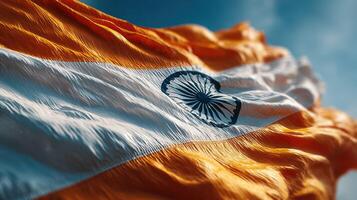 Indian flag waving brightly in the blue sky on a sunny day, symbolizing national pride and unity among citizens photo
