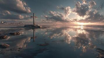 Sunset reflection at the beach with a cross and a city skyline in the distance photo