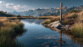 Peaceful waters reflect a wooden cross amid tranquil mountain landscape at dusk photo
