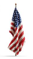 Waving American flag displayed prominently on a flagpole in a bright and clean setting showcasing patriotism and national pride photo