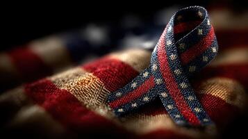 Red, white, and blue ribbon on a fabric background showcasing patriotism and national pride during a solemn occasion photo