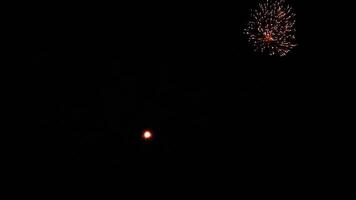 Vibrant fireworks display lighting up the night sky. Stunning celebration footage capturing the colors and energy of festive event. Perfect for themes of holidays, national celebrations video