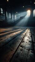 Basketball court illuminated by sunlight with dramatic shadows at dusk in an old gymnasium photo