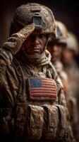 Soldiers salute during a ceremonial event in a dusty environment at sunset, showcasing dedication and patriotism with an American flag patch photo
