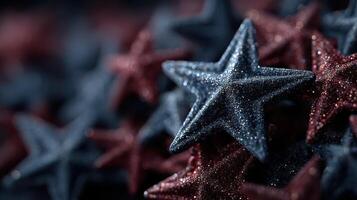 Stars in shimmering red and black hues create a vibrant decoration for festive occasions and celebrations photo