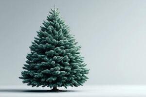 Artificial evergreen tree standing alone in a well-lit room during winter season photo