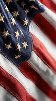 American flag waving in the wind with detailed fabric texture and vibrant colors captured during the day time photo