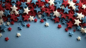 Colorful star-shaped sprinkles in red, white, and blue create a festive display for celebrations and events photo
