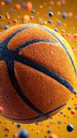 Bright orange basketball with texture against a vibrant yellow background filled with colorful spheres in mid-air photo