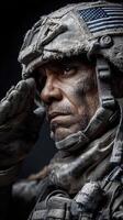 Soldier salutes with determination and pride in a dramatic close-up portrait in a combat uniform photo