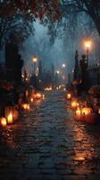 Candlelit path lined with pumpkins in a misty graveyard at twilight during autumn festivities photo