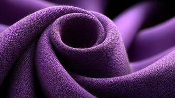 Textile abstract swirl showcasing rich purple fabric with intricate texture and depth in a dynamic close-up view photo