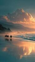 Group of riders on horseback walking along a tranquil shoreline during sunset with mountains in the background photo
