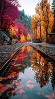 Vibrant autumn colors reflected on a serene train track beside the flowing river photo