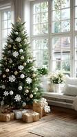 Festive evergreen tree adorned with decorations and gifts in a cozy, well-lit living room during the holiday season photo