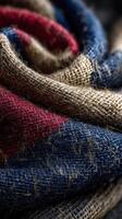 Woven fabric showcasing intricate patterns and textures in rich colors and natural fibers photo