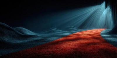 Red carpet leading towards illuminated stage in a dark, mysterious environment at night photo