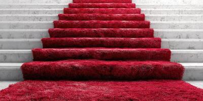 Vibrant red carpeted steps create a striking and inviting entrance in a modern interior setting photo