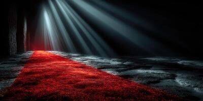 Elegant red carpet on dark stone floor illuminated by soft beams of light in an atmospheric setting photo