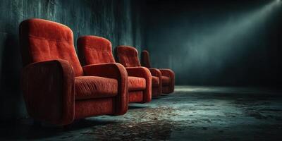Deserted red chairs in a dimly lit industrial space create a nostalgic atmosphere of solitude and reflection photo