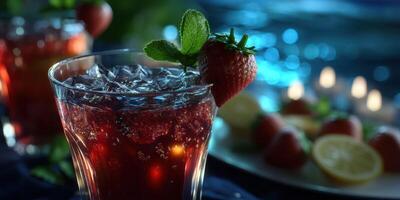 Refreshing summer beverages with strawberries and mint near water at night photo