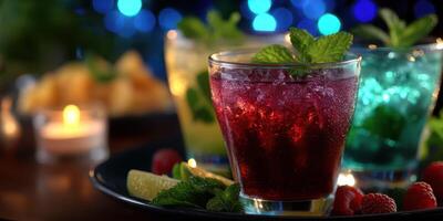 Refreshing summer cocktails in vibrant colors served on a table with snacks during a festive evening photo