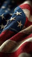 American flag in close-up revealing textured fabric and vibrant colors during daylight photo