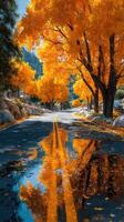 Vibrant autumn landscape featuring a winding road lined with golden trees reflecting in water puddles photo