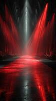 Dramatic red lighting creates an intense atmosphere in an expansive indoor venue during an evening event photo